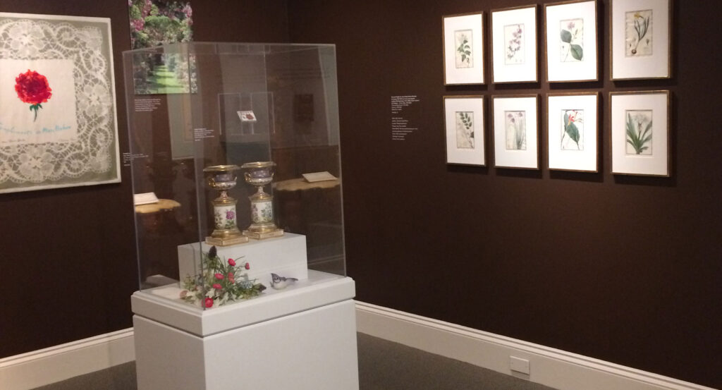 Floor display of prints and ornate candle holders