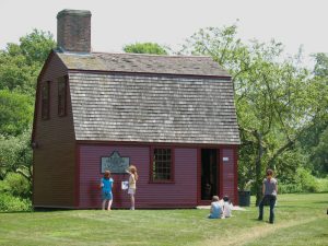 Exterior Guard House with kids reading a sign