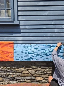 RISING SneakPeek exterior banner display